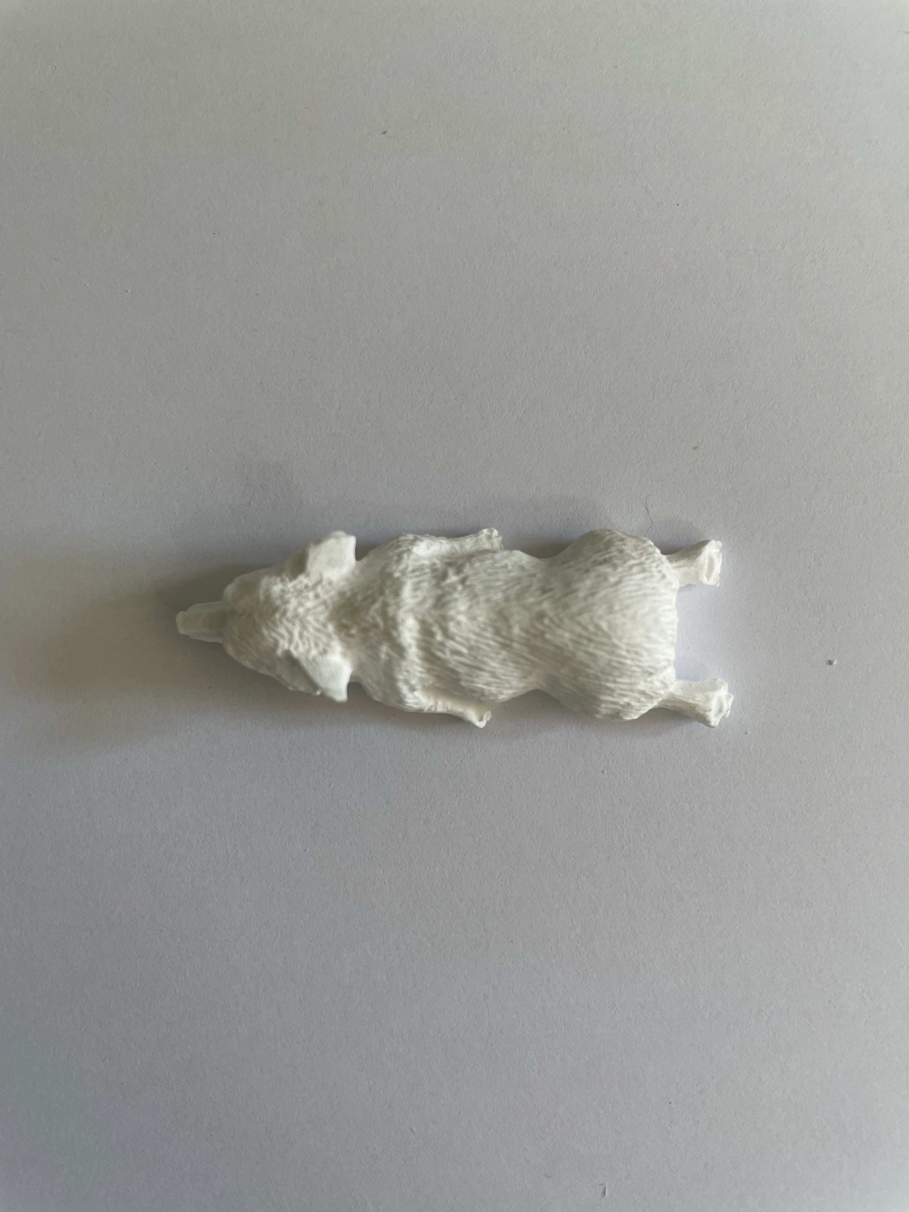 Resinite Small laying dog