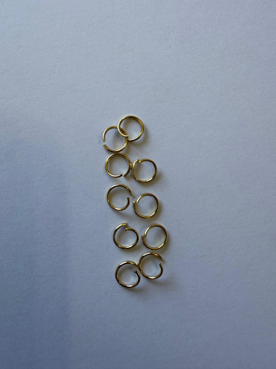 C091 - Golden open jump rings (7 x 0,8mm) (5 Pairs)