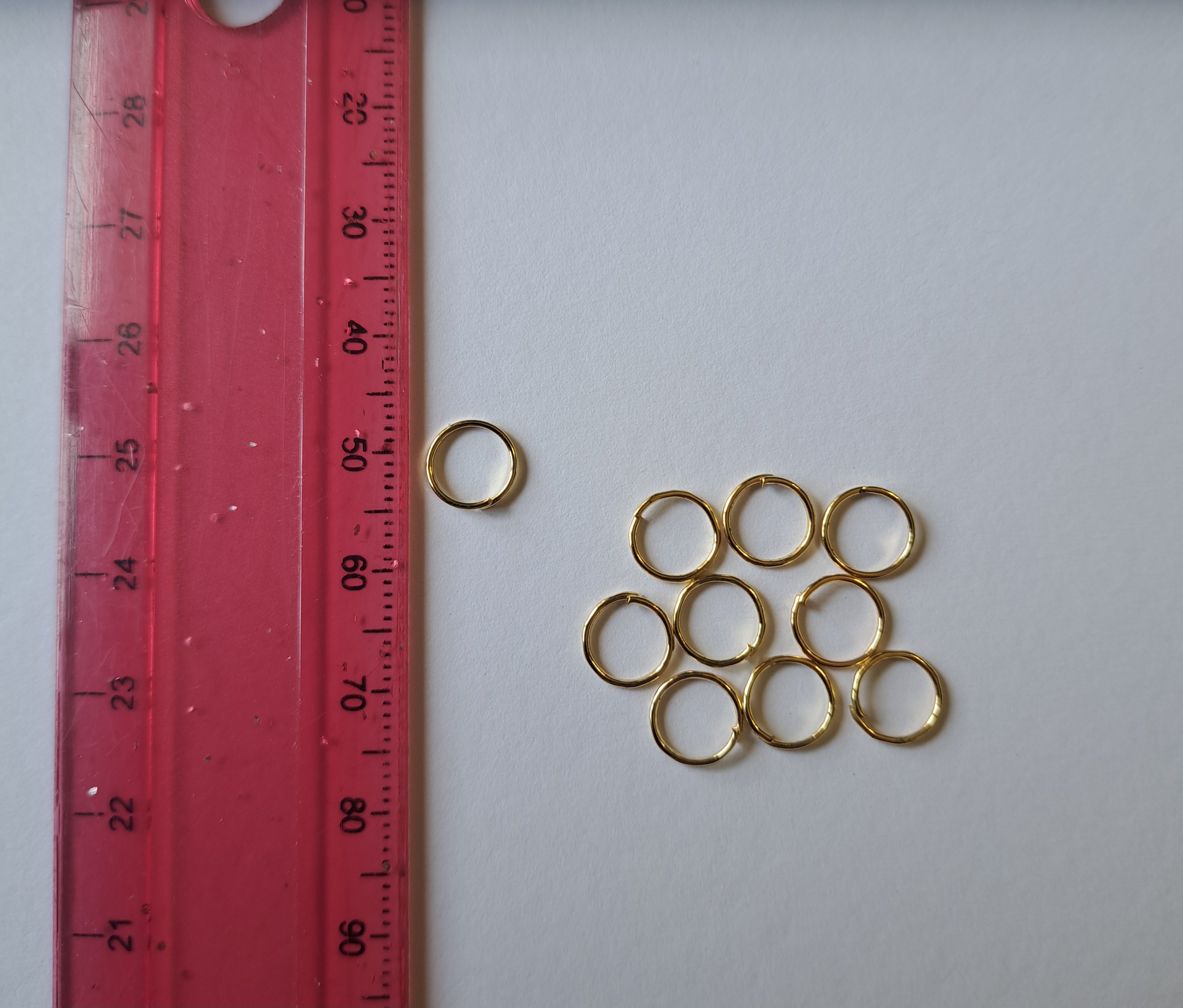 Golden open jump rings (7 x 1mm) (5 Pairs)